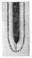 FIG. 34. BINDING SLITS
WITH PIECE ON CROSS.