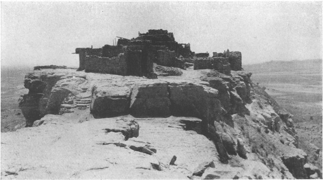 The Moki Indian pueblo of Walpi, in northeastern Arizona,
stands on a mesa high above the plain