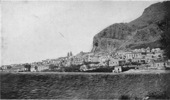 Cefalù, across the fields from a car-window of the fast
Palermo express.