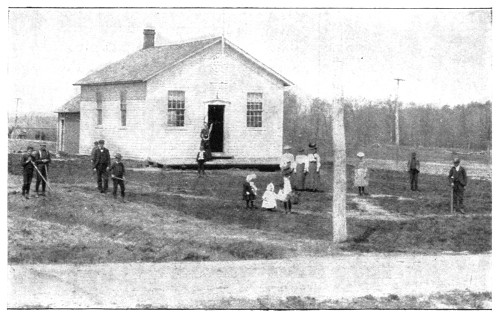 Fig. 1. Junior Gardeners beginning the work of cleaning up a New York school ground.