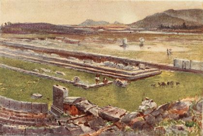 MEGALÓPOLIS IN ARCADIA

The east ramp of the Theatre is in the foreground to the left, from
which we see remains of the proscenium and colonnade. Beyond are a few
drums of columns, probably belonging to the Thersilion or Town Hall. The
river Helisson shows in the distance. Sunset.