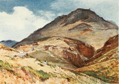 THE ACROPOLIS OF MYCENÆ FROM THE SOUTH-WEST, BACKED BY
THE IMPOSING FORM OF MOUNT ELIAS

The gorge to the right is the valley which served as a defence for the
Acropolis on the south side. The piece of road to the left is within a
few paces of the famous bee-hive tomb known as the Treasury of
Atreus.