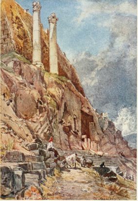 THE CAVERN CHAPEL (PANAGIA SPELIOTISSA) ON THE SOUTH SIDE
OF THE ACROPOLIS

This is the site of the Choragic monument of Thrasyllus. The square
opening is cut in the scarped face of the Acropolis rock at the top of
the Theatre of Dionysos. Above stand two columns, which supported
tripods dedicated to the god.